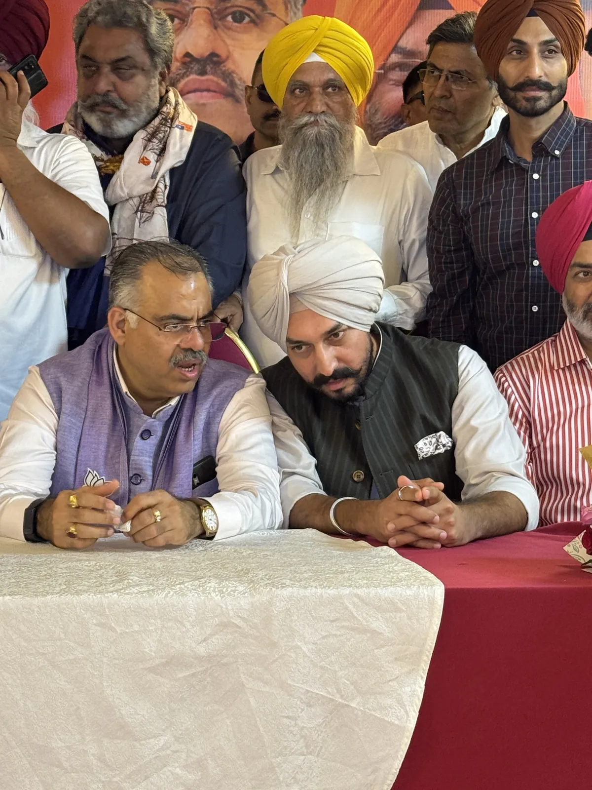 At a press interaction alongside party colleagues